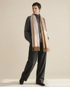 Wildfool reversible scarf folded flat showing the two-color cross section