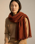 Color range overhead — oat, slate, navy herringbone lambswool scarves