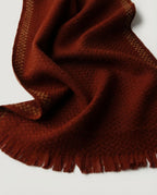 Scarf wrapped once showing the herringbone pattern and contrast stripe together