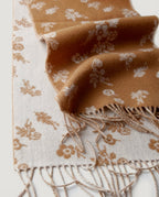 Wildflower scarf worn wrapped once around the neck — front portrait in daylight