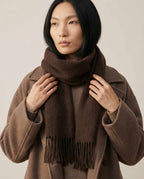 Wildfool superfine wool slim scarf in oat — full flat lay on cream linen