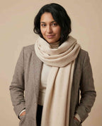 Wildfool brushed lambswool scarf being wrapped around the neck — motion shot