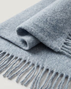 Side drape of the 200cm scarf showing the length falling past the hip