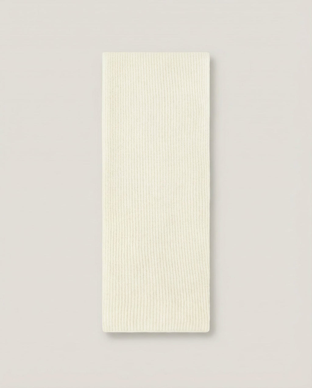 Collar draped loosely around the neck without a coat — casual styling shot