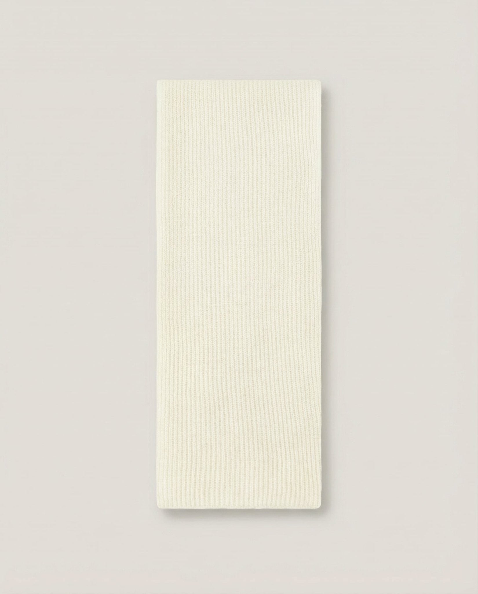 Collar draped loosely around the neck without a coat — casual styling shot